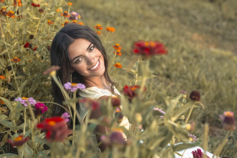 senior-student-smiling-in-a-field-of-flowers-clover-farm-cincinnati-1-scaled-1